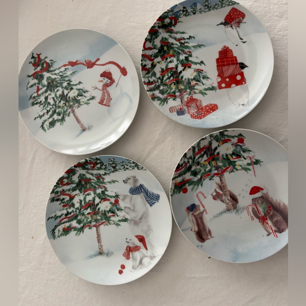 Set of four "North Pole Trading Company Santa Salad Plates"